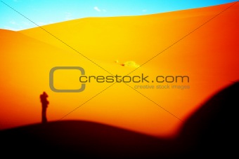 Human silhouette in desert