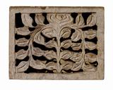 Carved decorative pale stone panel