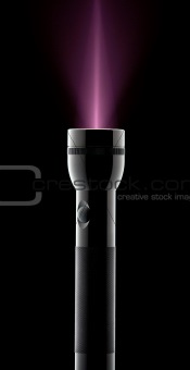 flashlight projecting purple light