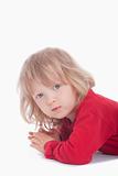 boy with long blond hair looking at camera - isolated on white