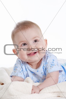 portrait of sweet little baby girl with a blanket - isolated on white