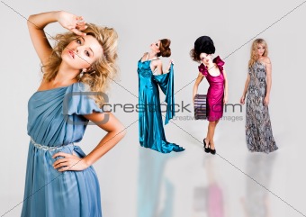 Young Women Modeling Elegant Fashions