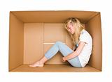 Woman in a cardboard box