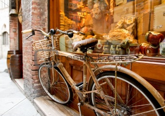 Bicycle in front of store window - Sienna, Italy