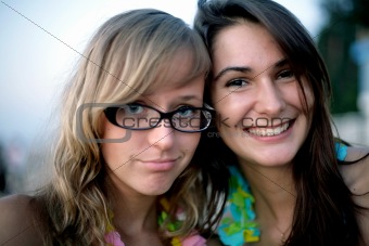 two young smiling girls portrait
