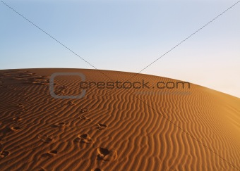 sunset over Sahara desert 