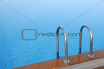 The steps into a swimming pool 