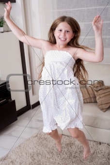 Young little girl jumping 