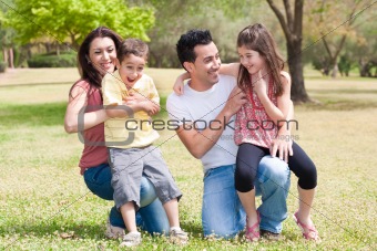 Happy family enjoying in a park