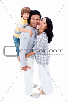Joyful family hugging each other