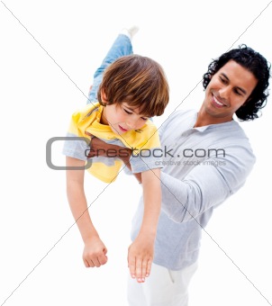 Cheerful father having fun with his son 