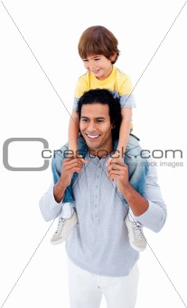 Joyful father giving piggyback ride to his son