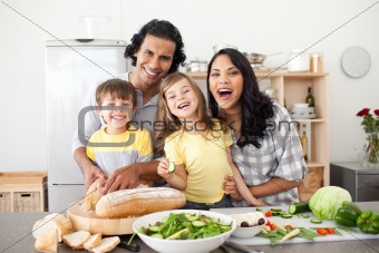 Lively family having fun in the kitchen