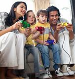 Lively family playing video game 