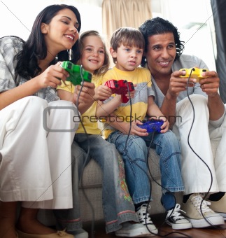 Lively family playing video game 
