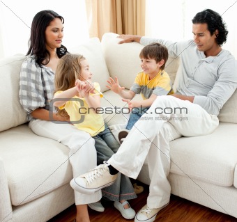Lively family having fun in the living room