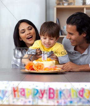 Jolly family celebrating the son's birthday 