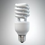 White energy saving light bulb on white