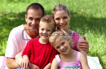 Close-up of a happy family smiling at the camera
