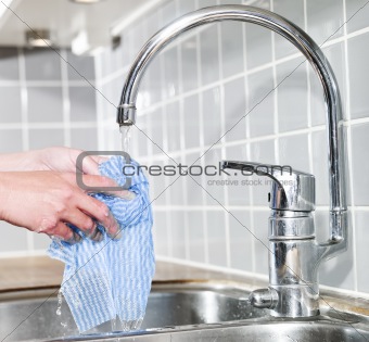 Dish Cloth under running water