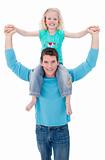Father giving daughter piggy back ride with thumbs up against white background