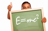 Proud Hispanic Boy Holding Chalkboard with the Theory of Relativity and Thumbs Up Isolated on a White Background.