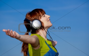 Happy woman listen music