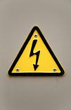 Grungy high voltage sign 