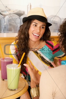 Two Young Women at a Cafe