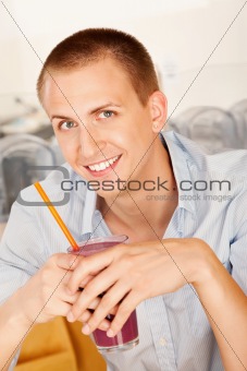 Young Man Drinking a Smoothie