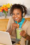 Woman With Laptop and Smoothie
