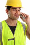 Builder  tradesman on telephone