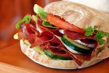Appetizing sandwich with ham and vegetables