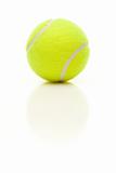 Single Tennis Ball with Slight Reflection Isolated on a White Background.