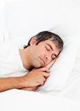 Portrait of an attractive man sleeping 