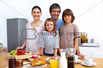 Happy family having a breakfast 