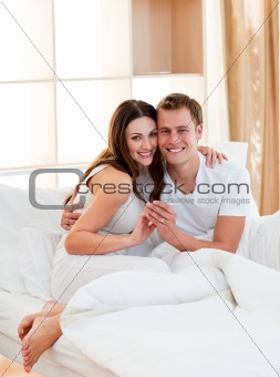 Romantic couple finding out results of a pregnancy test 