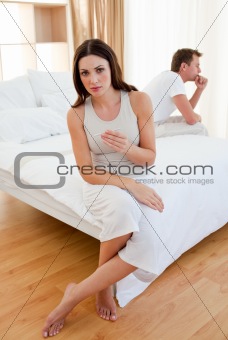 Disapointed couple finding out results of a pregnancy test