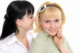Young women listening gossip