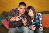 Hispanic Man and Girl Playing Video game