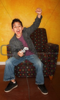 Hispanic Boy Playing Video Game