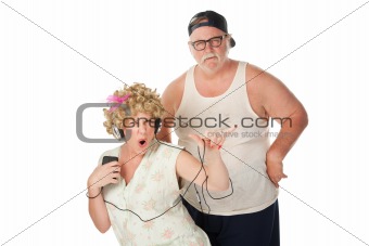 Hillbilly wife dancing with annoyed husband