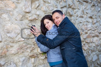 Young couple playing around in the nature