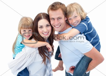 Adorable family enjoying piggyback ride against a white background