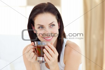 Attractive woman drinking tea
