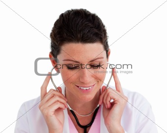 Confident female doctor holding a stethoscope