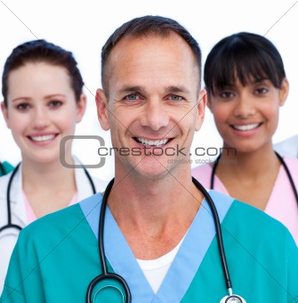 Portrait of a male doctor and his medical team