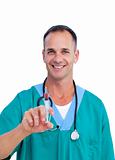 Portrait of a smiling doctor holding a syringe