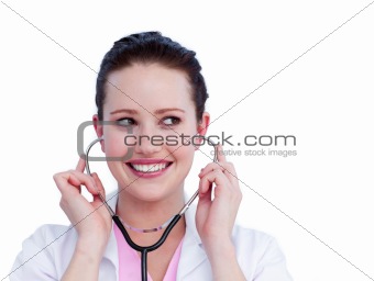 Portrait of a charming female doctor holding a stethoscope
