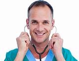 Portrait of a handsome male doctor holding a stethoscope